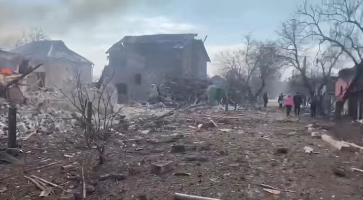The aftermath of Russian artillery shelling on a residential area in Mariupol where a rocket hit a house, according to the Armed Forces of Ukraine, during the Russian invasion of Ukraine, in Mariupol, Ukraine, is seen in this screengrab from a video uploa
