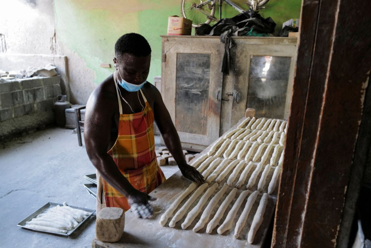 Emmanuel Asante, 36, a baker, prepares rolls of bread dough at the Bethel Brothers bakery in Accra, Ghana, March 6, 2022. Picture taken March 6, 2022. 