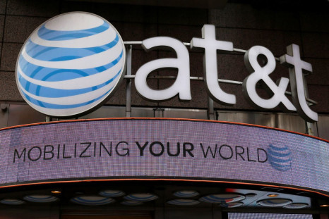 Signage for an AT&T store is seen in New York October 29, 2014.  