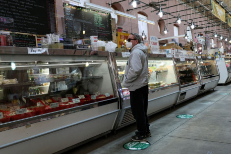 A man shops at the Eastern Market in Washington, U.S., February 11, 2022. 