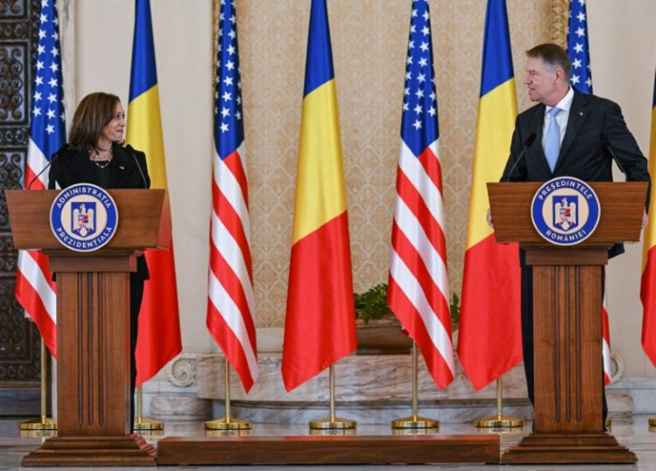 Kamala Harris, seen with Romanian President Klaus Iohannis, said Russia appears not to be serious about a diplomatic outcome in Ukraine