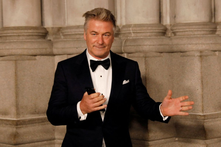 Actor Alec Baldwin gestures before walking on the red carpet during the commemoration of the Elton John AIDS Foundation 25th year fall gala at the Cathedral of St. John the Divine in New York City, in New York, U.S. November 7, 2017. 