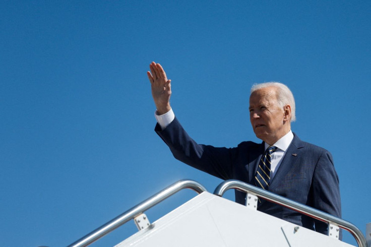 U.S. President Joe Biden waves as he boards Air Force One for travel to Philadelphia from Joint Base Andrews, Maryland, U.S. March 11, 2022.