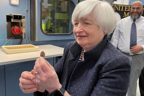 U.S. Treasury Secretary Janet Yellen looks at the first Maya Angelou quarter to be minted as she visits the Denver Mint for the production of the first quarter created in honor of the poet, writer and civil rights activist in Denver, Colorado, U.S.,  Marc