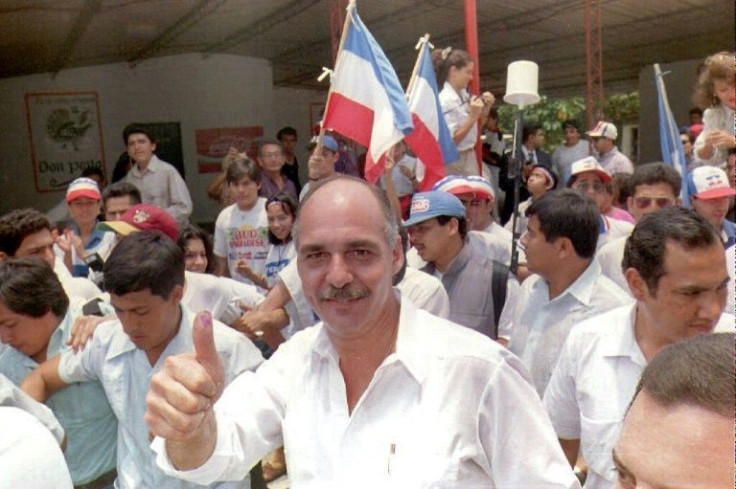 El Salvador has ordered the arrest of former president Alfredo Cristiani, seen here in 1994 in San Salvador, in connection with the killing of six Jesuits in the civil war in 1989
