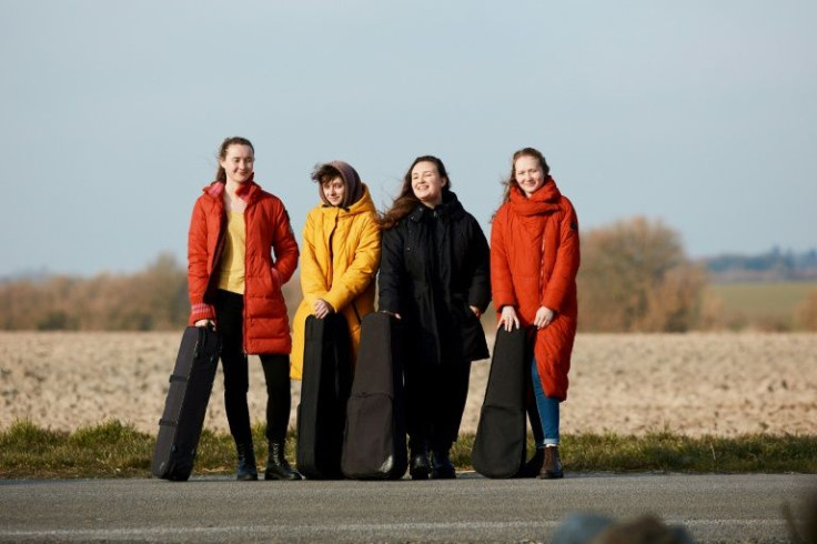 Four Ukrainian musicians, all violinists, fled the invasion of their country to a music school in Denmark