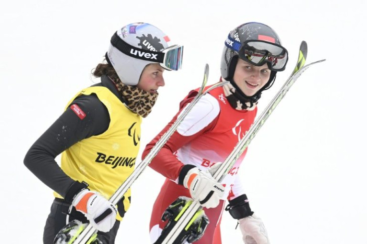 Veronika Aigner (right) achieved a second Paralympic title in two days guided by her sister Elisabeth (left)