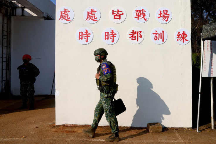 Army reservist troop takes part in a shooting training at a camp base in Nanshipu, Taiwan March 12, 2022. 