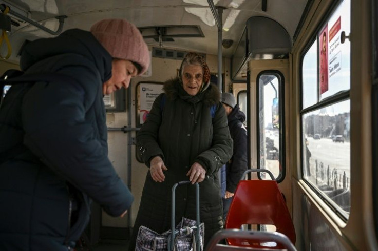 Kyiv's trams navigate checkpoints and occasional piles of rubble to keep the city running in wartime