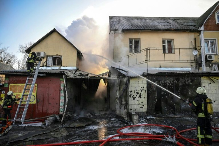 A shelling attack on the 17th day of Russia's assault on Kyiv set fire to a row of houses on the city's outskirts
