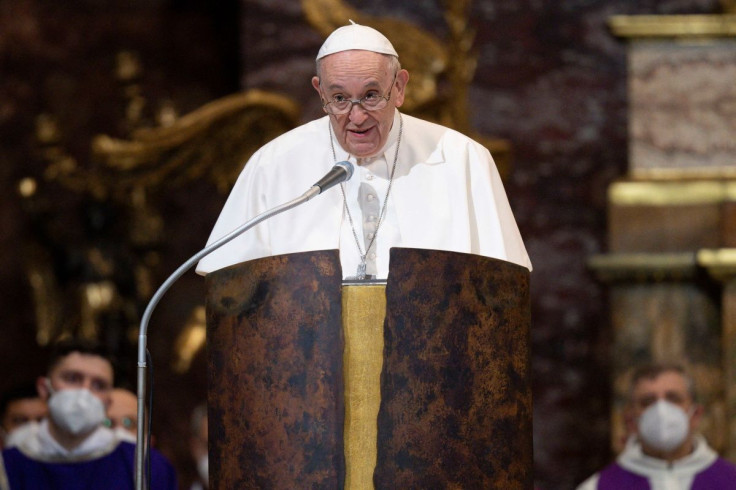 Pope Francis speaks to the audience during the Holy Mass on the 400th anniversary of the Canonisation of St Ignatius of Loyola, Saint Isidoro the Farmer, Francesco Saverio, Saint Teresa of Jesus and Filippo Neri, at the Jesuit Church of the Most Holy Name