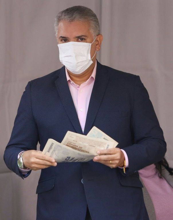 Outgoing Colombian President Ivan Duque votes at a polling station in Bogota