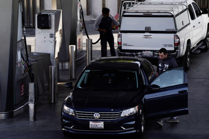 People refuel their vehicles with gasoline at the Helios House, the first LEED-certified gas station in the United States, in West Olympic Boulevard in Los Angeles, California, U.S., March 10, 2022. Picture taken March 10, 2022. 