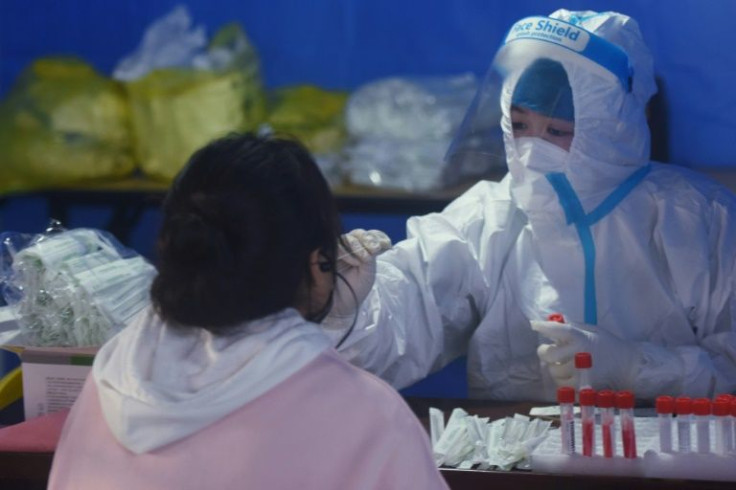 China reported 2,300 new virus cases nationwide on Monday and almost 3,400 a day earlier, the highest daily figure in two years