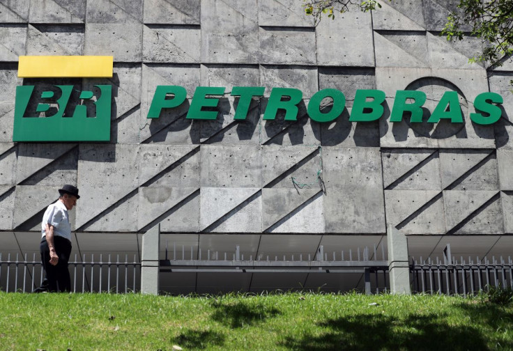 A man walks in front of the headquarters of Petroleo Brasileiro S.A. (Petrobas) in Rio de Janeiro, Brazil March 9, 2020.