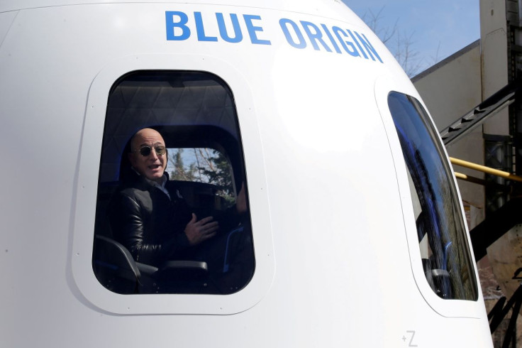 Amazon and Blue Origin founder Jeff Bezos addresses the media about the New Shepard rocket booster and Crew Capsule mockup at the 33rd Space Symposium in Colorado Springs, Colorado, United States April 5, 2017.  