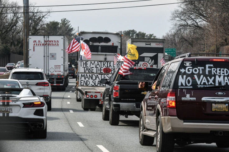 Vehicles, including 18-wheeler trucks, RVs and other cars drive towards Washington, D.C., after some of them arrived as part of a convoy that traveled across the country, to protest coronavirus disease (COVID-19) related mandates and other issues, in Hage
