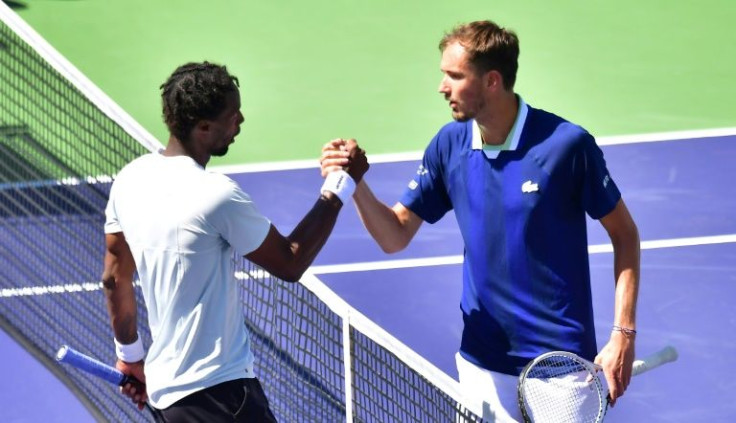 Russia's Daniil Medvedev (right) congratulates Gael Monfils after crashing out of the Indian Wells Masters on Monday