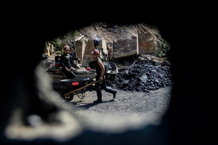 Miners in Lobatera work in teams as part of small-scale cooperatives where they share the profits of their labour