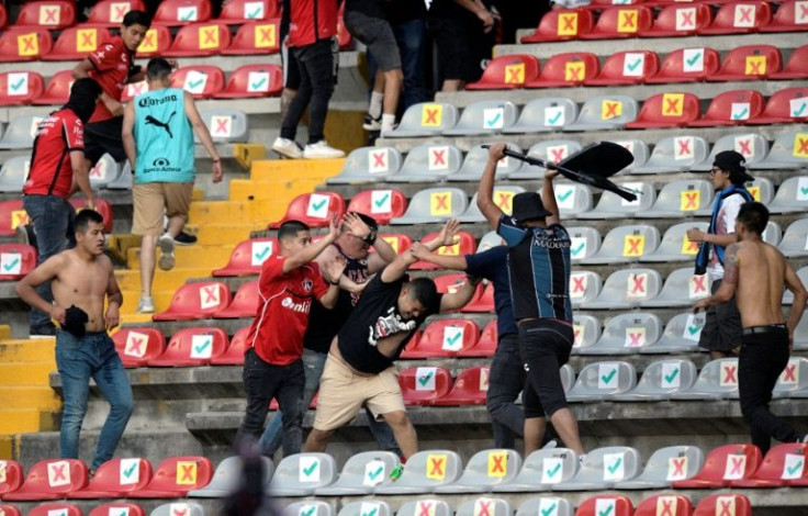 The violence between visiting Atlas supporters and home fans in Queretaro drew global attention