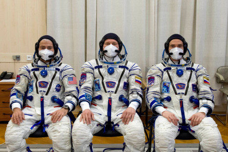 The International Space Station crew members are pictured during space suit check at the Baikonur Cosmodrome