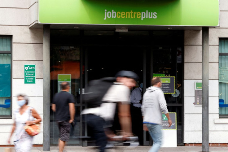 People walk past a branch of Jobcentre Plus, a government run employment support and benefits agency, in Hackney, London, Britain, August 6, 2020. 