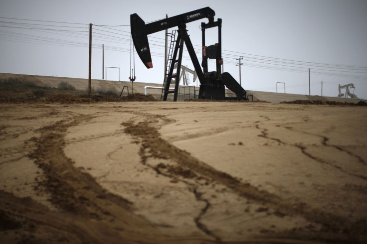 A pump jack is seen on an oil field near Bakersfield on a foggy day, California January 17, 2015. 