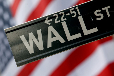 A street sign is seen in front of the New York Stock Exchange on Wall Street in New York, February 10, 2009. 