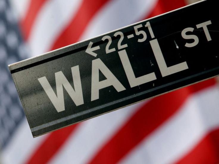 A street sign is seen in front of the New York Stock Exchange on Wall Street in New York, February 10, 2009. 