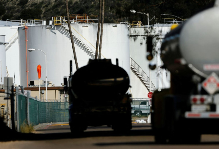 Gasoline trucks arrive to refill their tankers at a gasoline distribution terminal in San Diego, California January 7, 2015 