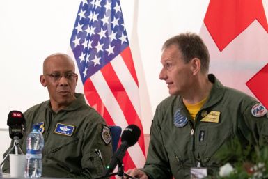 Chief of Staff of the U.S. Air Force General Charles Q. Brown Jr. listens to Commander of the Swiss Air Force General Peter Merz during a news conference at a Swiss airbase in Payerne, Switzerland March 15, 2022.  
