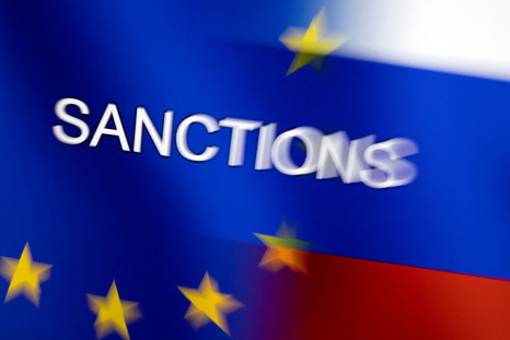 Word "Sanctions" is displayed on EU and Russian flags in this illustration taken, February 27, 2022. 