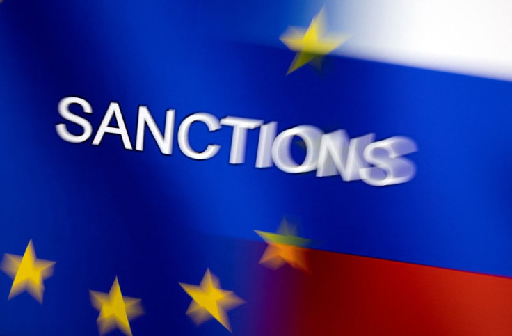 Word "Sanctions" is displayed on EU and Russian flags in this illustration taken, February 27, 2022. 