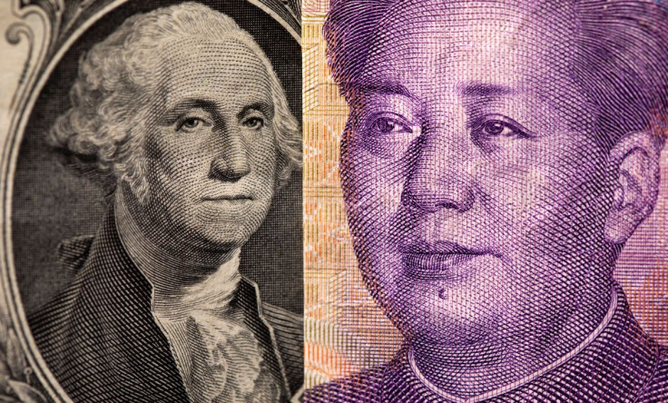 U.S. one dollar and Chinese Yuan are seen in this illustration taken May 7, 2021. 