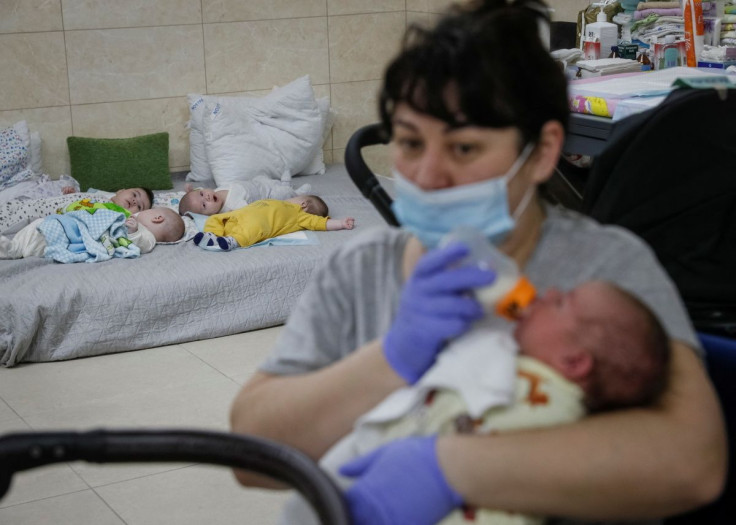 Nurse  Oksana Martynenko looks after surrogate-born babies inside a special shelter owned by BioTexCom clinic in a residential basement, as Russia's invasion continues, on the outskirts of Kyiv, Ukraine March 15, 2022. Picture taken March 15, 2022. 