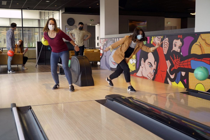 LDLC computer hardware retailer office staff play bowling at the company headquarters in Limonest near Lyon, France, March 10, 2022.