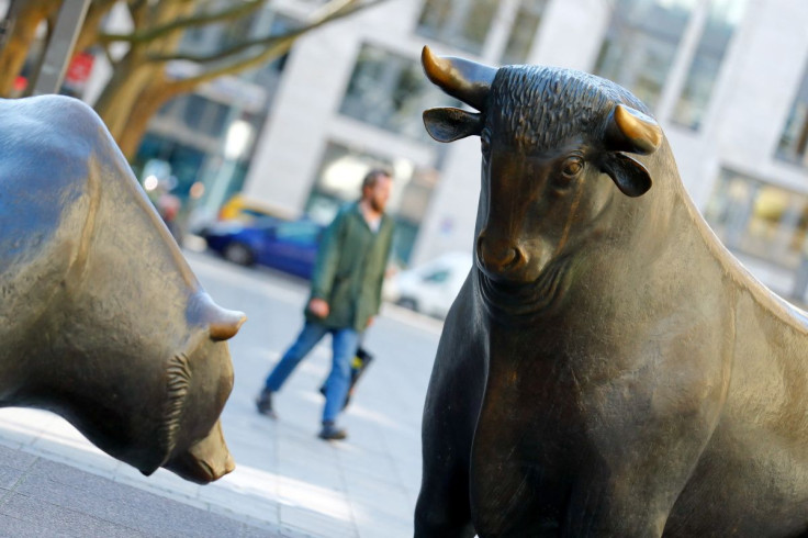 Bull and bear, symbols for successful and bad trading are seen in front of the German stock exchange (Deutsche Boerse), in Frankfurt, Germany, March 25, 2020.