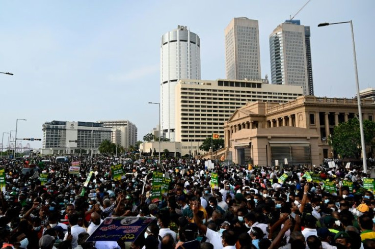 A huge crowd tried to storm the Sri Lankan president's seaside office on Tuesday as anger flared over runaway prices