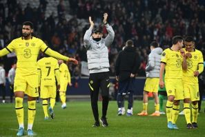 Thomas Tuchel celebrates with his players after Chelsea beat Lille to reach the Champions League quarter-finals
