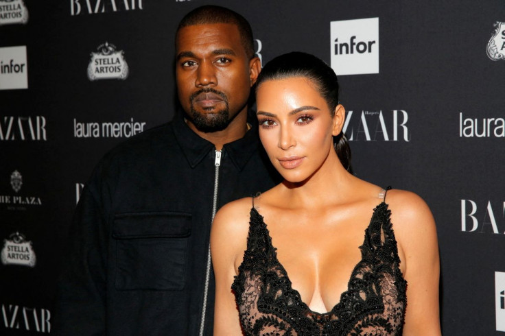 Kanye West and Kim Kardashian attend the celebration 
