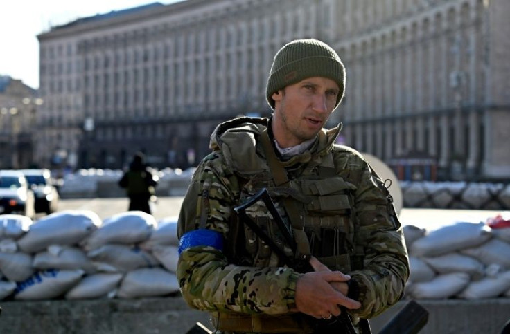 Former Ukrainian tennis star Sergiy Stakhovsky says "I cannot say that I feel comfortable around a rifle."