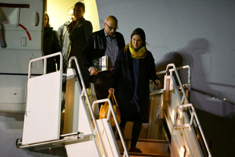 British-Iranian aid worker Nazanin Zaghari-Ratcliffe and dual national Anoosheh Ashoori disembark from a plane, after being freed from Iran, at RAF Brize Norton military airbase in Brize Norton, Britain, March 17, 2022. Leon Neal/Pool via REUTERS