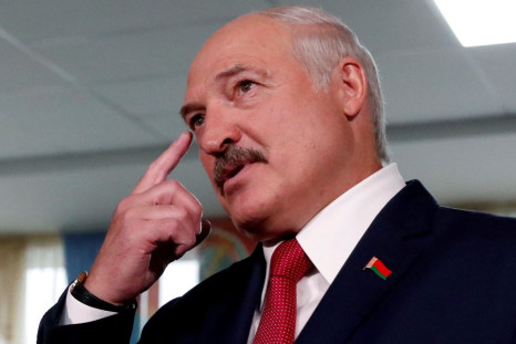 Belarusian President Alexander Lukashenko addresses the media after casting his vote during the parliamentary election in Minsk, Belarus November 17, 2019. 