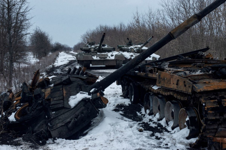 A charred Russian tank and captured tanks are seen, amid Russia's invasion of Ukraine, in the Sumy region, Ukraine, March 7, 2022.  Irina Rybakova/Press service of the Ukrainian Ground Forces/Handout via REUTERS