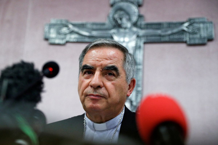 Cardinal Giovanni Angelo Becciu, who has been caught up in a real estate scandal, pauses as he speaks to the media a day after he resigned suddenly and gave up his right to take part in an eventual conclave to elect a pope, near the Vatican, in Rome, Ital