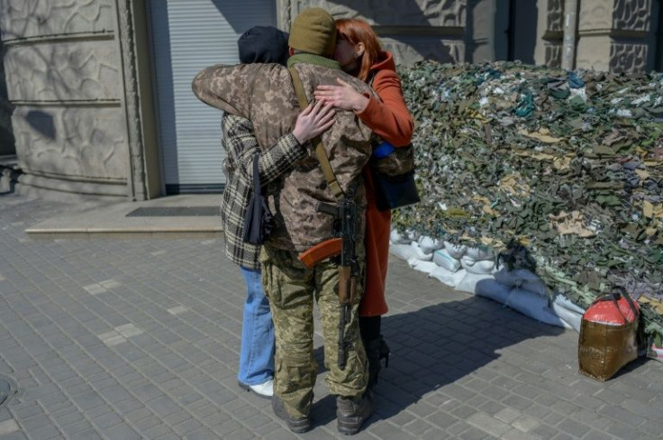 With the sweet scent of spring in the air and barricades dotting the city, Ukraine's port of Odessa, known as the pearl of the Black Sea, is clinging to peace, but braces itself for a Russian attack