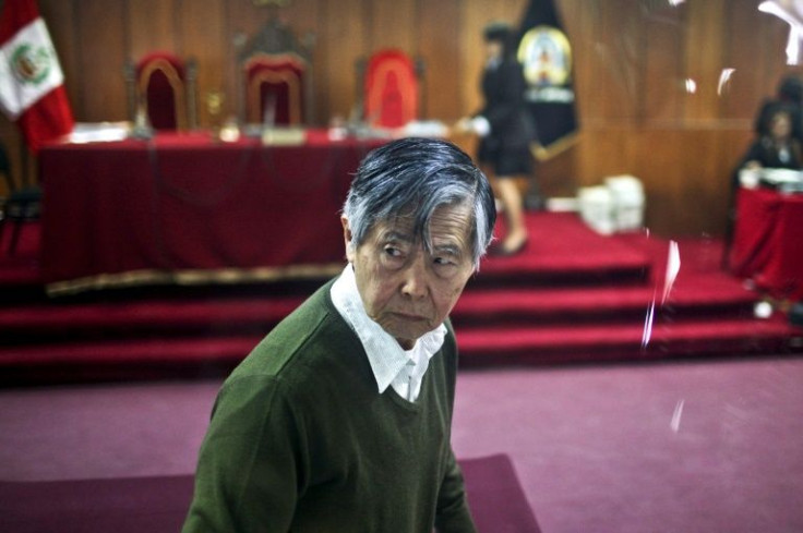 Peru's former president Alberto Fujimori, arrives for a hearing at a courtroom in Lima in October 2013