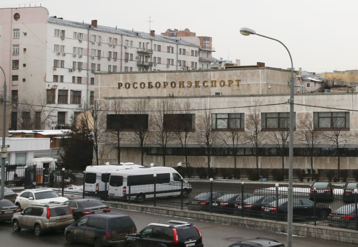 Vehicles are parked near the office building of Rosoboronexport company in Moscow, Russia, March 1, 2016. 