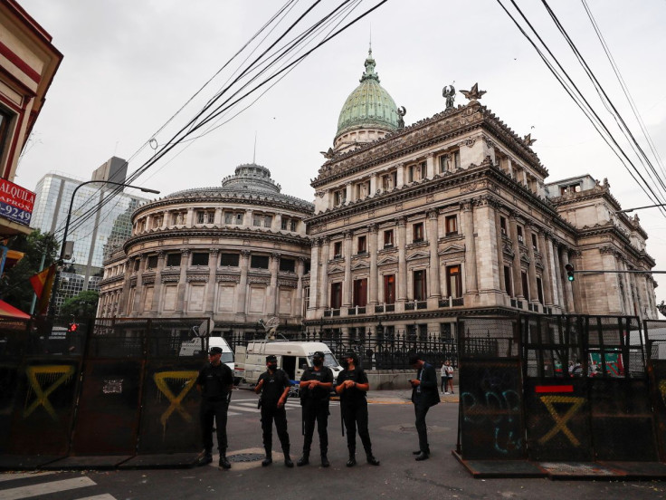 Police officers stand in front of the National Congress as the senate debates the government's agreement with the International Monetary Fund (IMF), in Buenos Aires, Argentina March 17, 2022. 