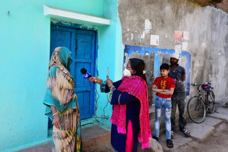 Geeta Devi (right) is a member of the Dalit community, the lowest rung in India's rigid caste system